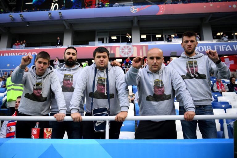 Serbia supporters displayed images of war criminal Ratko Mladic pictures and hurled abuse at Swiss Albanians before and during the match