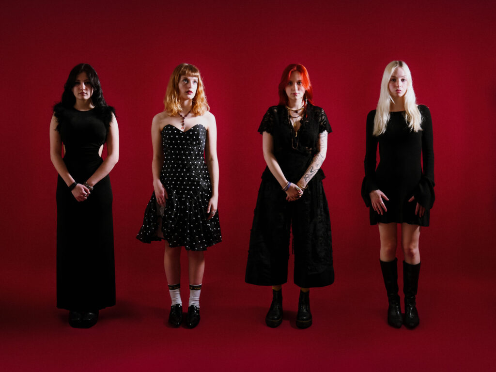 House of Women band members with Elsa Malazogu on the left. 